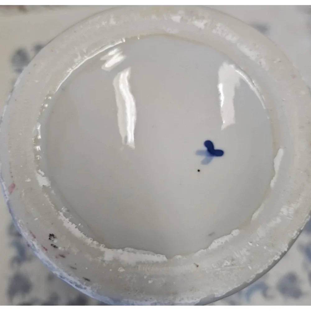 Blue and White Vase with Roses, Roses are outlined in the pottery so they show